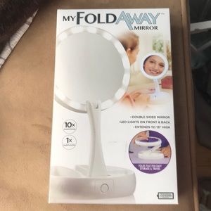 Fold away mirror